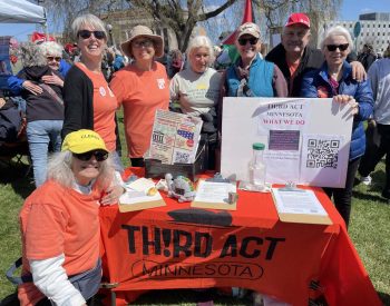 Third Act members tabling at protest