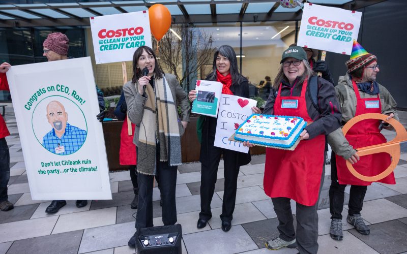 Costco members and activists deliver petitions at Costco headquarters.