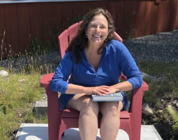 Diane sitting in chair