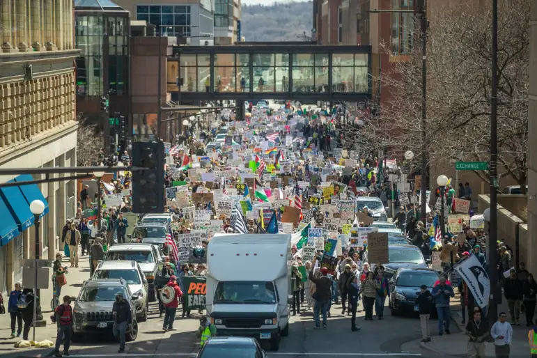 An estimated 15,000 people gathered in downtown St. Paul on April 19 for one of the nation’s largest Earth Day protests, rallying around environmental, political, and social justice issues. Credit: Chris Juhn/MSR
